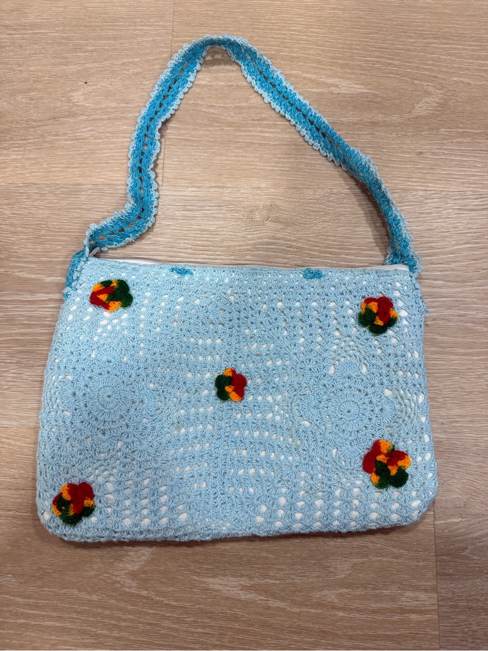 Handmade Light Blue Crochet Shoulder Bag with Floral Appliqués